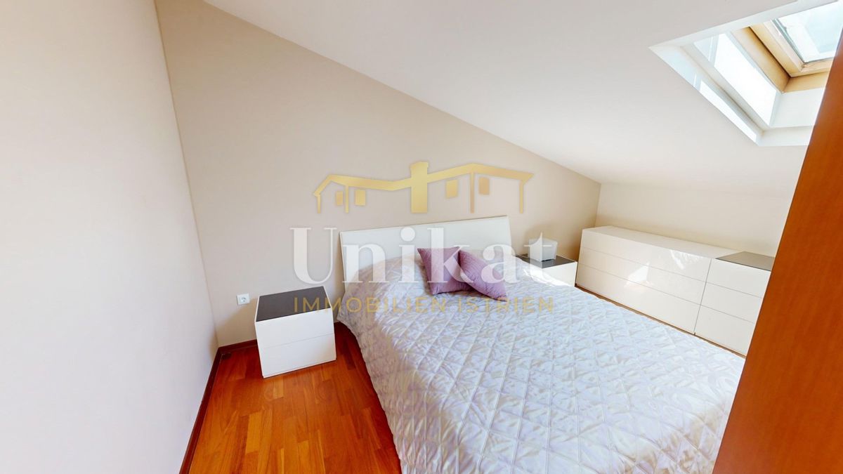 Appartamento su due piani con 4 camere da letto